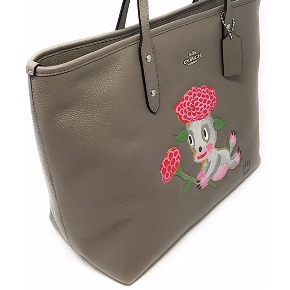 Super cute coach bag with puppy! BASEMAN X COACH